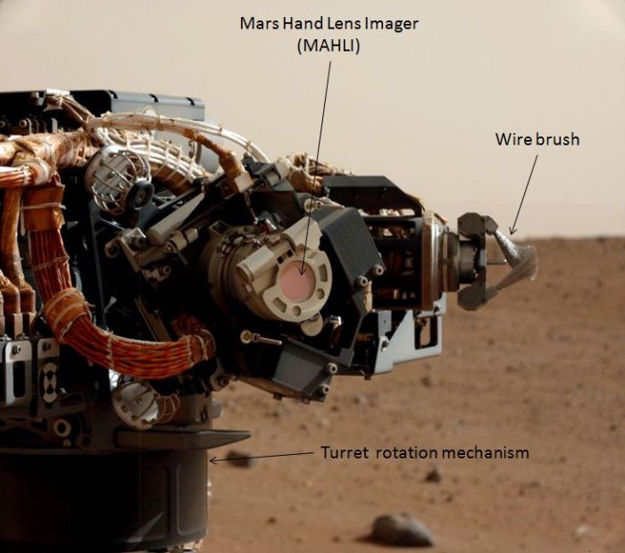 The MAHLI camera - the LEDs can be seen in the ring surrounding the circular lens, still protected in this image by its dust cover