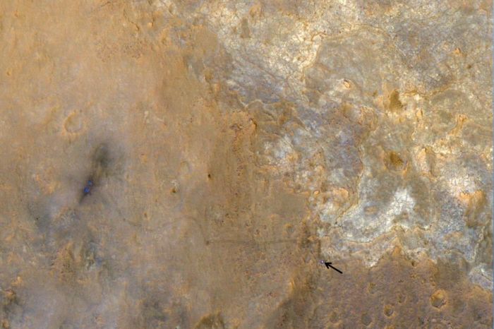 For scale, the two parallel lines of the wheel tracks are about 10 feet (3 meters) apart. HiRISE shot this image on June 27, 2013, when Curiosity was at an outcrop called "Shaler" in the "Glenelg" area of Gale Crater. Subsequently the rover drove away from Glenelg toward the southwest. When HiRISE captured this view, the Mars Reconnaissance Orbiter was rolled for an eastward-looking angle rather than straight downward. The afternoon sun illuminated the scene from the western sky, so the lighting was nearly behind the camera. Specifically, the angle from sun to orbiter to rover was just 5.47 degrees. This geometry hides shadows and reveals subtle color variations.(click to enlarge)