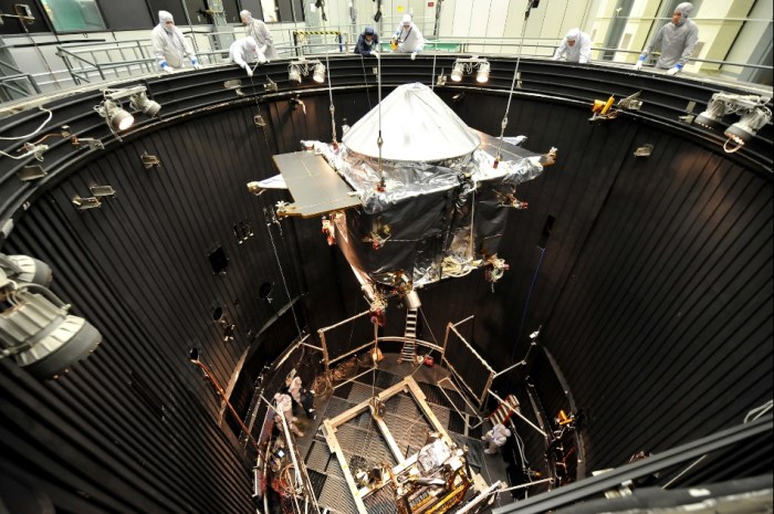 MAVEN is lowered in a Thermal Vacuum (TVAC) chamber where its systems will be tested in an environment simulating interplanetary space (image courtesy of Lockheed Martin)