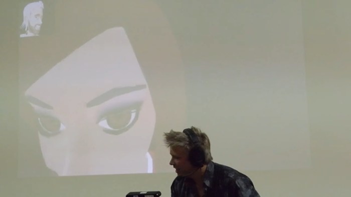 Whispering sweet nothings. note how Rosedale has turned his head, his avatar has turned its head in response, and Emily is leaning in (to his avatar on her screen) to whisper into his ear