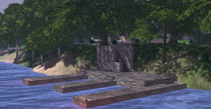 The jetties on the south side of the island and the house through the trees in the background. Fallingwater, Seanchai Library, Kitely