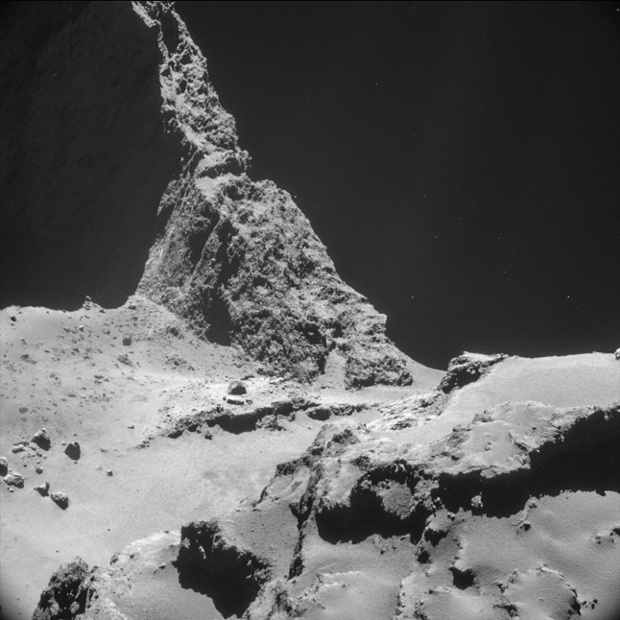 A close-up of the surface of 67P/C-G captured by Rosetta's navigation cameras on Tuesday, November 11th showcases a sttep cliff, demonstrating that comets have a complex composition, reather then being simple balls of rock, ice and debris