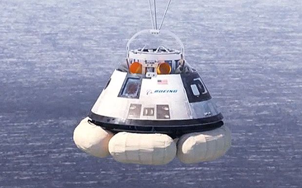 A Boeing CST-100 test article undergoing drop and floatation tests in 2014