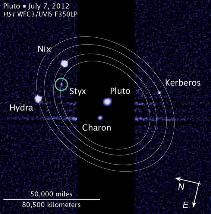 The Pluto-Charon system images by the Hubble Space Telescope in 2012, showing the moons orbiting both which have so far been discovered: 
