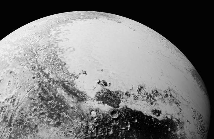 A synthetic perspective view of Pluto, based on the latest high-res received from New Horizons presents a view of Pluto from around 1,800 km (1,100 mi) above Pluto’s equatorial area. Towards the bottom of the image is the cratered and dark region dubbed "Cthulhu Regio", and above it, the bright "heart" of Pluto, showing the icy plains of "Sputnik Planum". The images used to create this view were captured from a distance of 80,000 km (50,000 mi) from Pluto