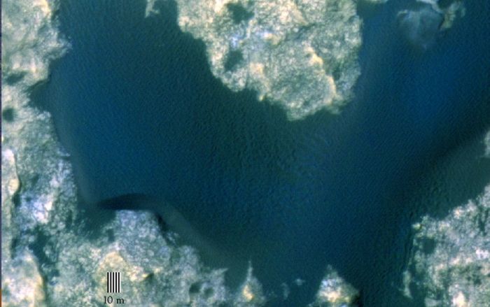 "dune 1" in the "Bagnold Dunes", imaged here by the High Resolution Imaging Science Experiment (HiRISE) camera on NASA's Mars Reconnaissance Orbiter (MRO) is roughly 300 metres across and as tall as a 2-storey building. The image is in false color, combining information recorded by HiRISE in red, blue-green and infrared frequencies of light.