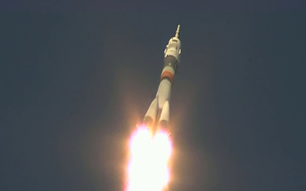 The Soyuz vehicle carrying the Expedition 47 crew to the ISS accelerates away from the launch pad, moments after lift-off on Tuesday, December 15th.