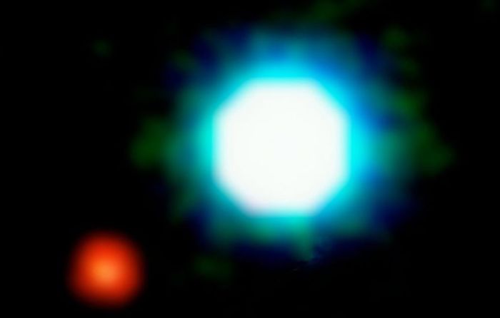 a composite image of the brown dwarf object 2M1207 (blue-white) and the planet 2M1207b, seen in red, located 170 light years from Earth in the constellation Centaurus. The photo is based on three near-infrared exposures with the taken with the 8.2-m VLT Yepun telescope at the ESO Paranal Observatory. Credit: ESO