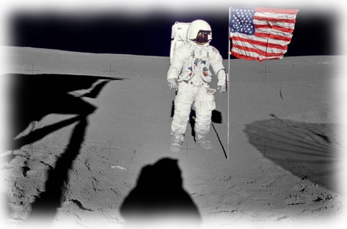Astronaut Edgar D. Mitchell, Apollo 14 Lunar Module pilot stands by the deployed U.S. flag on at the Frau Mauro landing site on February 5th, 1971. He was photographed by astronaut Alan B. Shepard Jr., mission commander. While astronauts Shepard and Mitchell descended in the Lunar Module "Antares" to explore the Fra Mauro region of the moon, astronaut Stuart A. Roosa, command module pilot, remained with the Command and Service Module "Kitty Hawk" in lunar orbit.