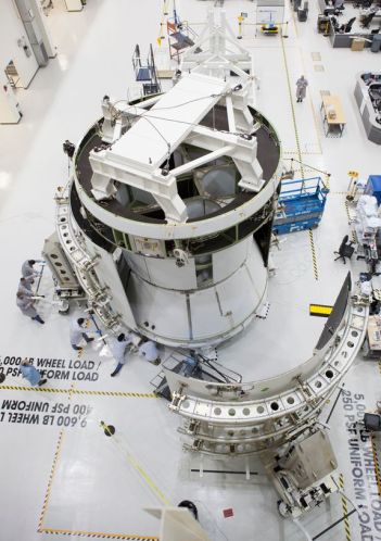 A European Orion Service Module having the launch payload fairings attached to it. The Orion vehicle is attached to the circular part of the Service module visible at the top. This was a structure flight test article used in Orion's first test flight in December 2014 (image: Airbus / ESA)