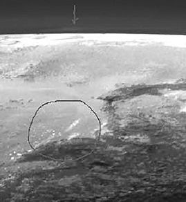 A closer look at what appears to be a cloud over the edge of "Sputnik Planum" (credit: NASA/JPL / JHU/APL / SwRI)