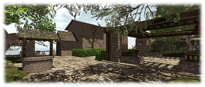 The new flagstone courtyard at the entrance to our island ruins, which helps integrate the pavilion (centre right) with the rest of the design