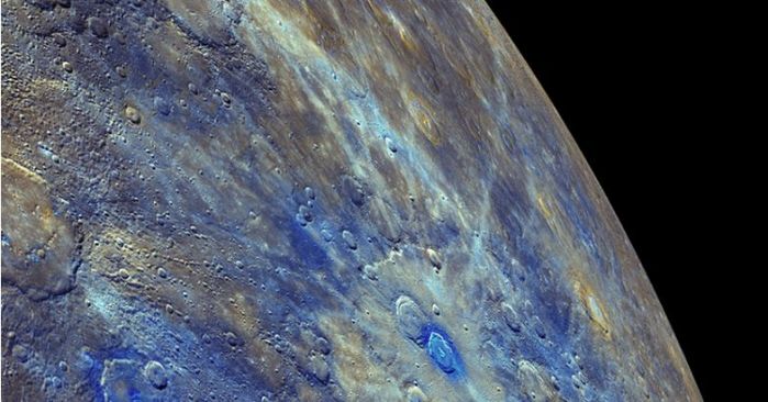 An enhanced colour image from MESSENGER highlights Mercury’s low-reflectance material (seen in blue) and its association with impact-excavated material around relatively young crater's on the planet's surface (credit: NASA/JPL / Johns Hopkins University Applied Physics Laboratory / Carnegie Institution of Washington