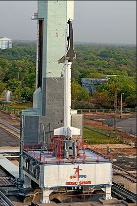 India's 6.5 metre long reusable launch vehicle technology demontrator (RLV-TD) sits atop its launch booster, prior to the 770-second test flight on May 22nd