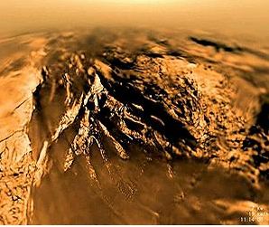 An image of Titan's surface, as taken by the European Space Agency's Huygens probe as it plunged through the moon's thick, orange-brown atmosphere on Jan. 14, 2005. Credit: ESA / NASA / JPL / Univ. of Arizona