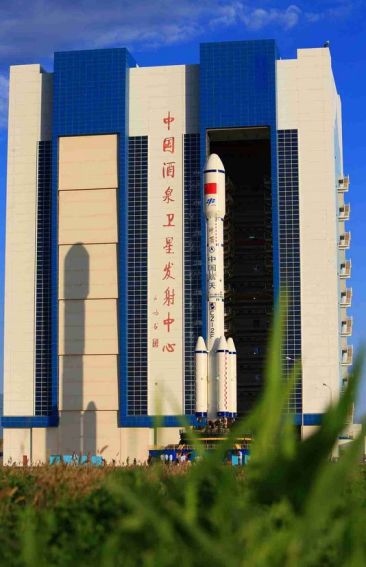 Tiangong-2, mounted on the top of its Long March 2F launch vehicle, emerged from its vehicle assembly building at China's Jiuquan Space Centre on September 9th, en route to the launch pad for an anticipated September 15th lift-off