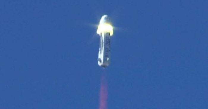 Moment of ignition: the rocket motors on the New Sephard capsule ignite as the vehicle separates from its launcher during a test of the launch abort system on October 5th, 2016. Credit: Blue Origin