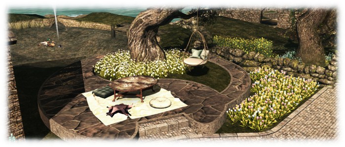 Our little ourdoor entertainmnet area, courtesy of Cory Edo and finished with items from Alex Bader (tree) and Mandingo Quan (hanging seat)