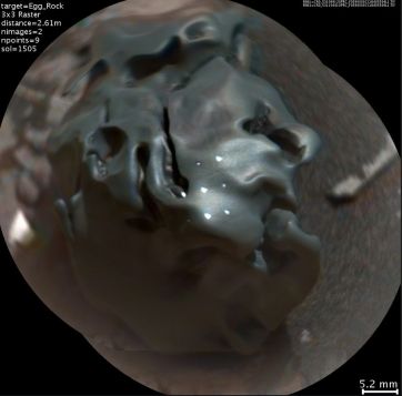 A magnified image of "Egg Rock" showing the initial size hits by the ChemCam laser (the six white points on the surface of the meteorite)