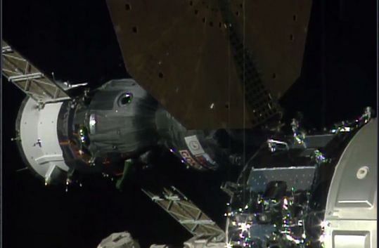 Soyuz MS-03, piloted by Oleg Novitsky, closes for a docking with the Russian-built Rassvet module on Saturday, November 19th. In the foreground is the Cygnus resupply vehicle which recently arrived at the space station, together with one of its circular solar power arrays