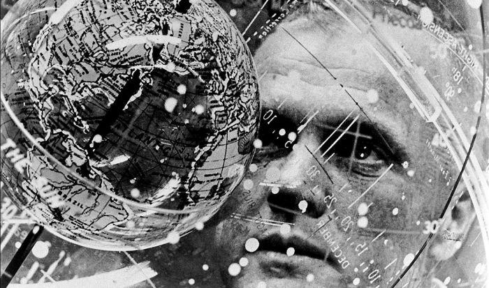 An unusual shot of John Glenn as he examines a celestial training device in preparation for his Mercury-Atlas orbital launch in February 1962. Credit: NASA