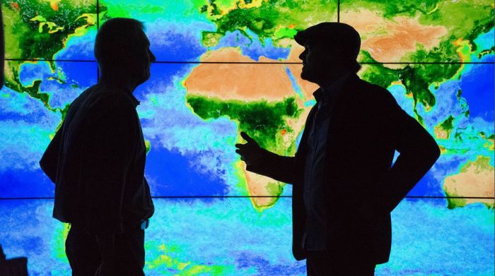 Sellers (l) discusses the realities of climate change with Leonardo DiCaprio in the National Geographic documentary, Before The Flood. Credit: National Geographic