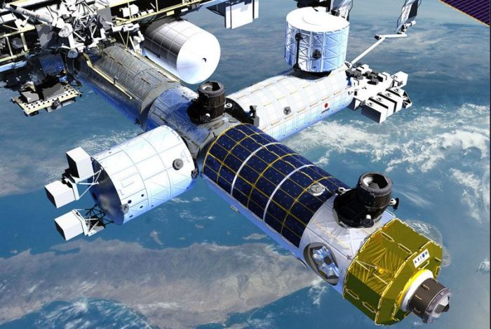Axiom would commence its space station by adding a module to the ISS (seen with the solar power panels wrapped around the module's hull). Credit: Axiom International